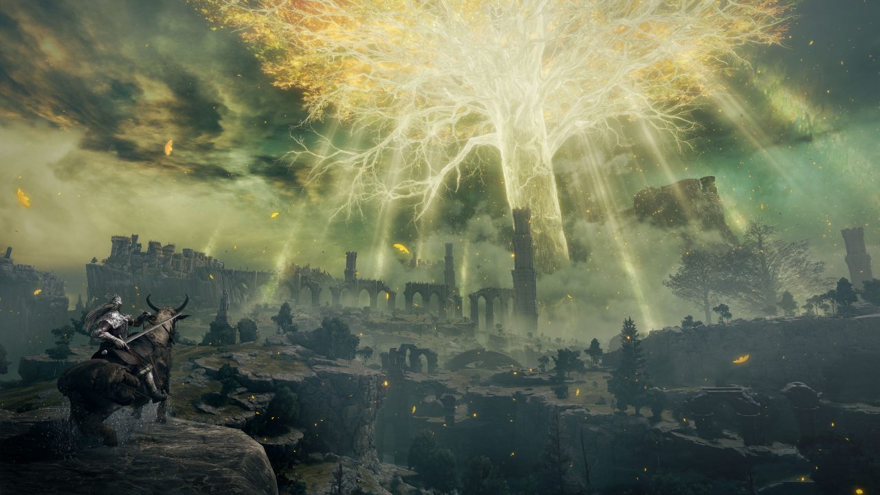 A screenshot from Elden Ring depicting a gargantuan golden tree, filtering rays of gold sunlight down on castle ruins.