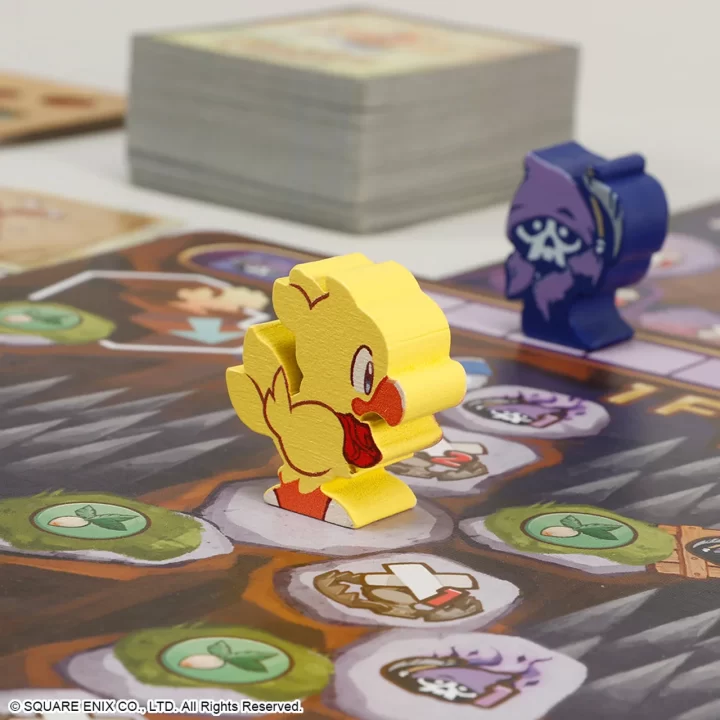 Closeup of Chocobo's Dungeon The Board Game character tokens.