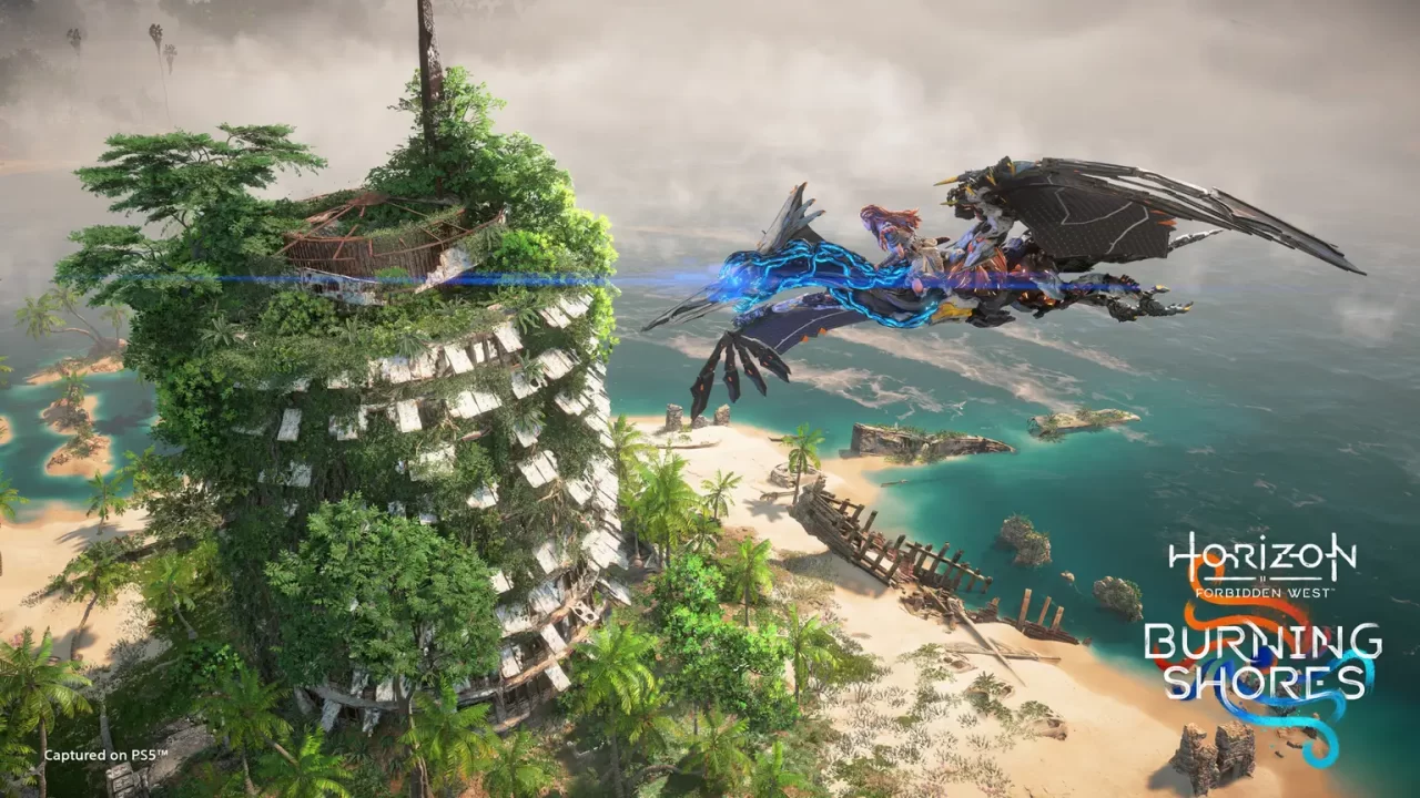 Horizon Forbidden West: Burning Shores screenshot of Aloy flying past an overgrown abandoned Capital Records building